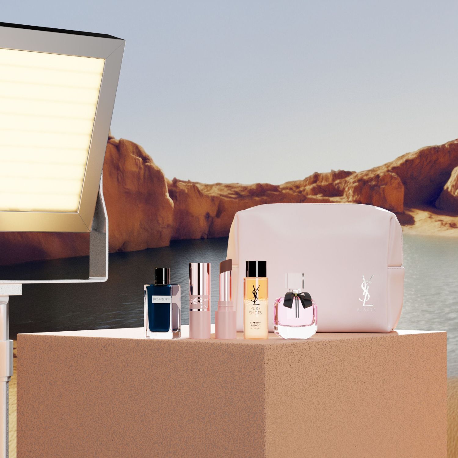 Set de belleza YSL con miniproductos y neceser rosa.
