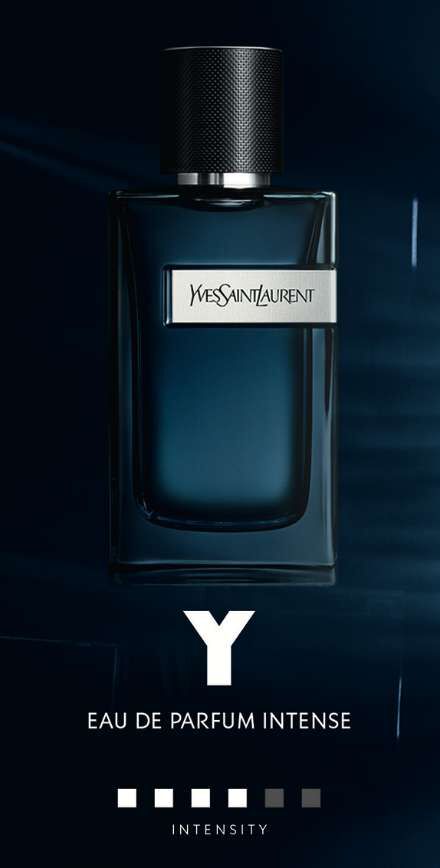 A dark blue glass perfume bottle labeled "Y Eau de Parfum Intense" by Yves Saint Laurent, displayed against a gradient background. The design emphasizes the perfume's elegance and intensity.