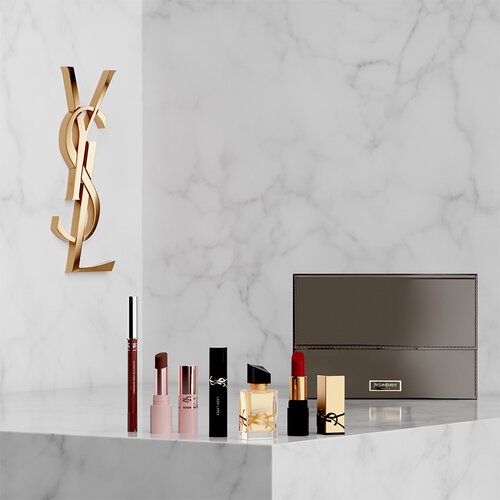 Set de belleza YSL con miniproductos y neceser.