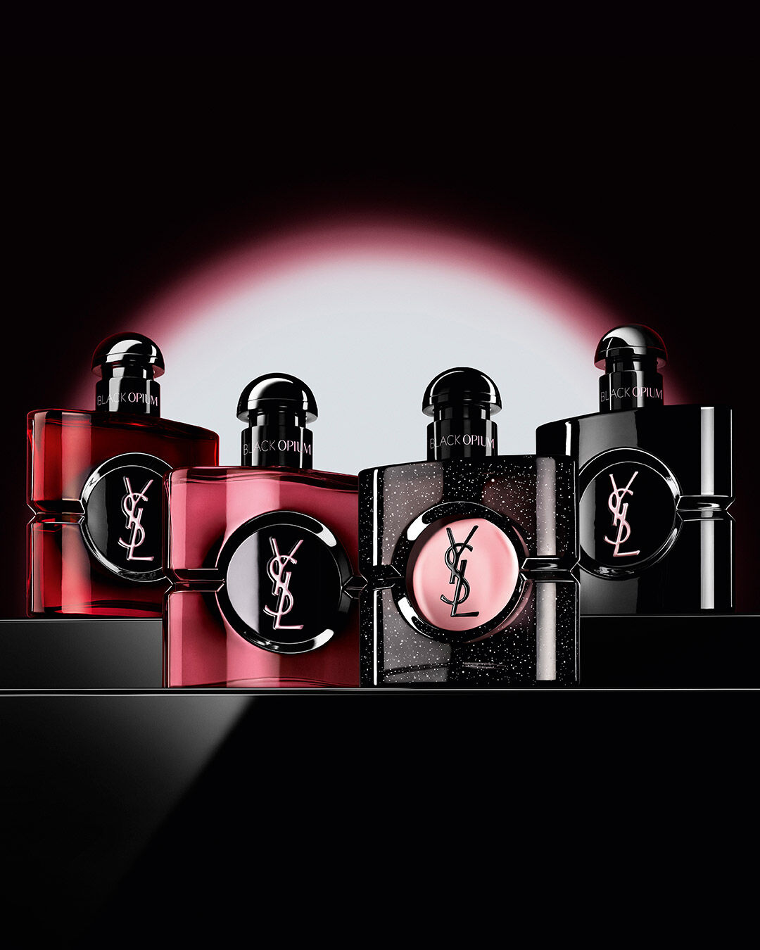 Black Opium perfume bottle surrounded by vanilla, coffee beans, jasmine, and cherries on a red background
