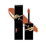 YSL The Inks Vinyl Cream en el tono 810, con un tubo negro y el logo dorado de YSL, y un corte en forma de corazon que revela el tono naranja.