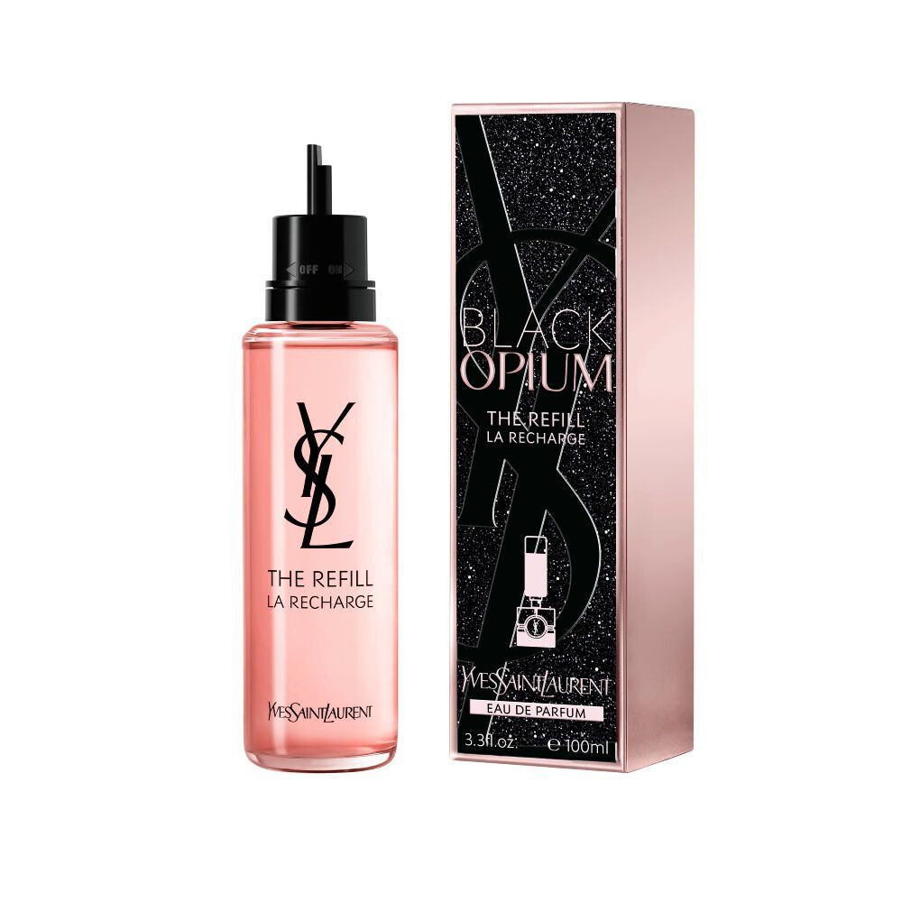 Frasco de recarga de Black Opium Eau de Parfum junto a su caja negra con purpurina a juego, con la Cassandre de YSL.