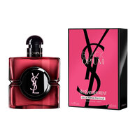 Frasco de Black Opium Eau de Parfum Pink Glaze junto a su
                        caja fucsia y negra con el Cassandre de YSL.